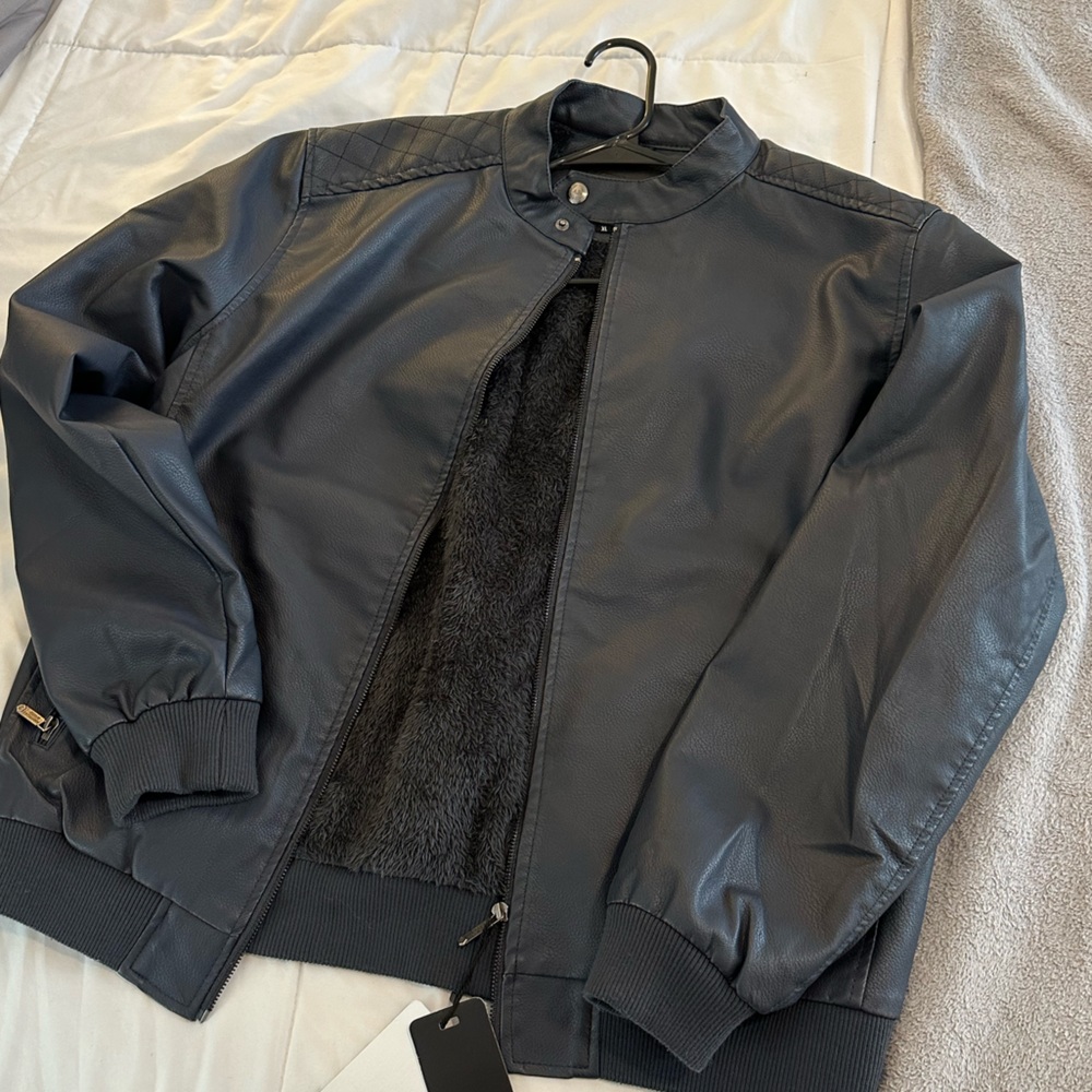 Men’s Faux Leather Motorcycle Jacket with faux fur lining. Tags still attached.